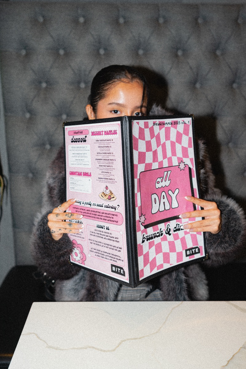 BITE menu in hand